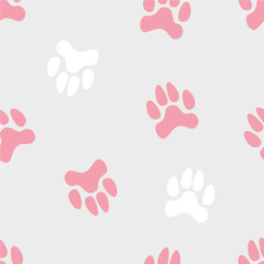 Fototapeta na wymiar Vector seamless cute pattern with colored turned traces of animals on a grey monochrome background. Can be used for wallpapers, paper, typography, clothes, fabric, web design. For girls
