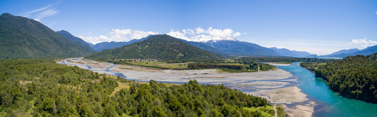 aerial view with drone of the Puelo River that crosses its basin of the same name until reaching the sea of the South Pacific
