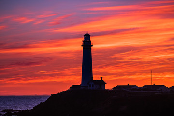 Fiery sunset at Pigeon Point Lighthouse State Park on the Pacific Ocean coastline, Pescadero, California