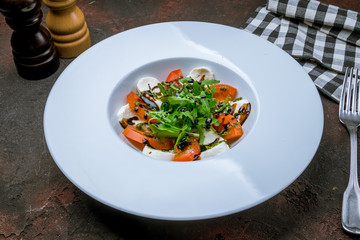 Caprese salad with mozzarella and tomato