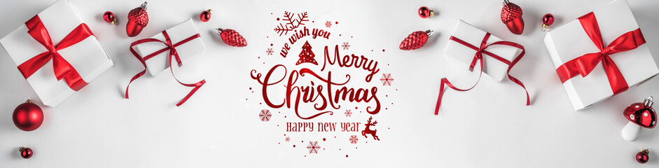Christmas gift boxes with red ribbon and decoration on white background. Xmas and Happy New Year...