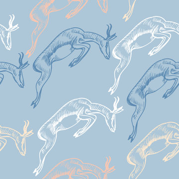 Seamless antelopes pattern in african style. 