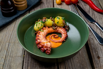 grilled octopus on plate