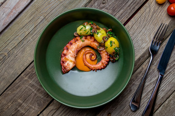 grilled octopus on plate