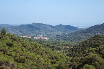 Fototapeta na wymiar Landscape with a Cornudella de Montsant - a highland town in the famous wine-producing comarca of Priorat, Tarragona, Catalonia, Spain.