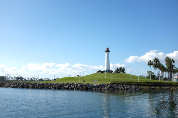 Lighthouse looks out over Long Beach California shoreline