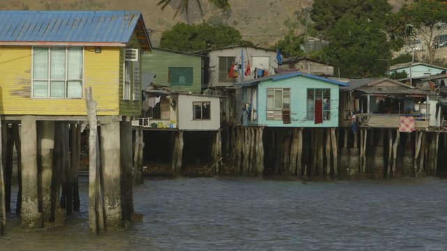 Close up still shot of locally constructed  stilt houses at the Ocean shore, Hanuabada Port Moresby