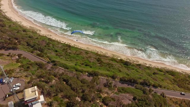 Amazing drone footage of paragliders out at sea