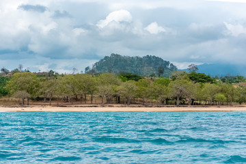    Sao Tome, beautiful landscape, village, beach and rainforest in background 