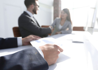 financial graph in hands of the businessman.business background