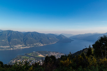 Fototapeta na wymiar Panorama of the lake maggiore and delta of locarno ascona from cimetta
