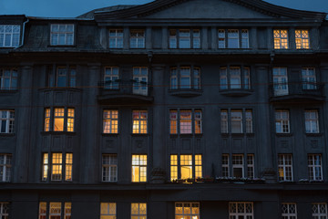 Switched on light in the windows of big house