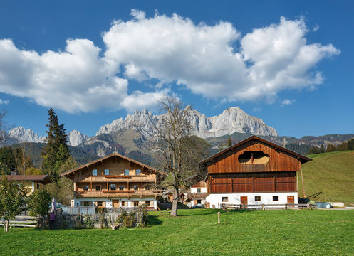 View of the village Going am Wilden Kaiser against the Alps. District of Kitzbuehel, region of Soelllandl, state of Tyrol, Austria, Europe.