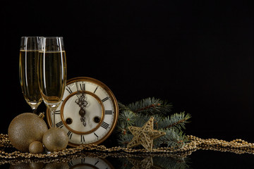 Champagne, clock and Christmas ornaments