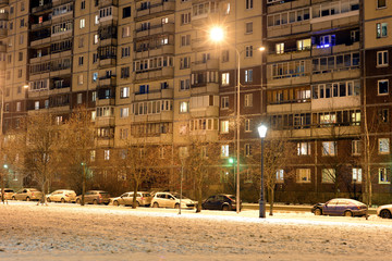 Modern residential building at winter night.
