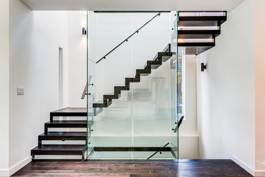 Modern custom staircase made of glass and metal