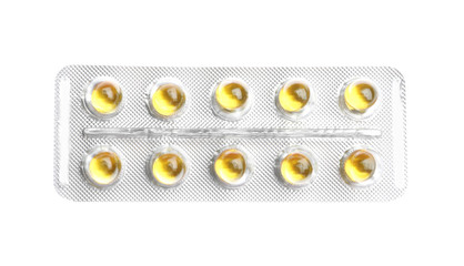 Pills in blister pack on white background, top view