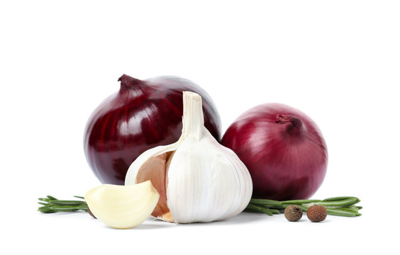 Garlic, onions, allspice and rosemary on white background