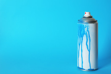 Used can of spray paint on color background. Space for text