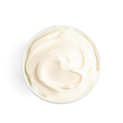 Bowl with fresh sour cream isolated on white, top view