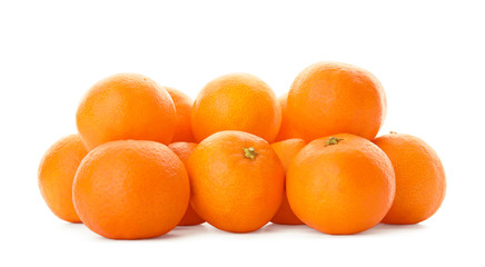 Heap of fresh ripe tangerines on white background