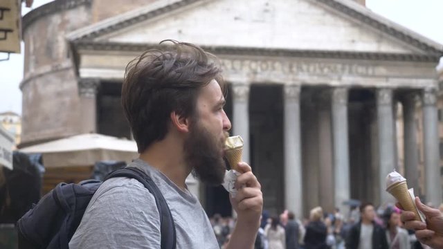 Young Male Tourist Eating Gelato Outside The Pantheon.