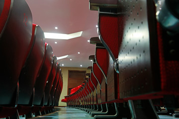 stacked chairs in the theatre, China