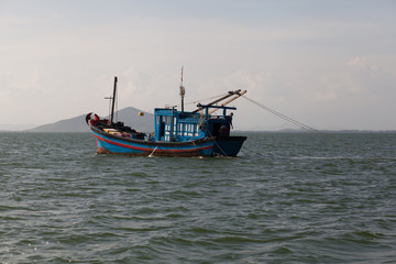 Obraz na płótnie Canvas Fishing boat on the sea in Vietnam