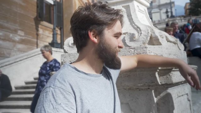 Male Tourist Posed For A Picture On Street In Rome.
