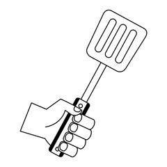hand holding spatula