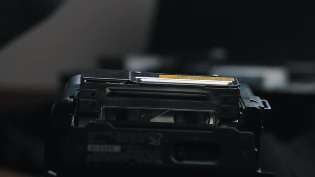 Playing an old mini-dv tape on a camcorder.