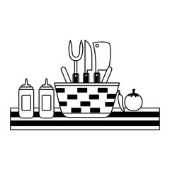 wicker basket picnic sauces and utensils