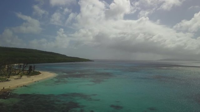 Aerial drone shot along the coastline of Tinian.  An island in the Philippine Sea.