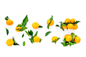 New Year and Christmas Eve with mandarins. Citrus winter fruits on white background top view