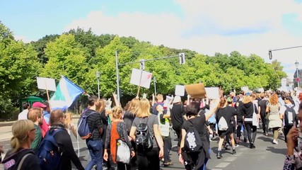 An animal rights march that took place in Berlin, Germany on 26th August 2018. Activists can be seen walking in mass along the street, holding up signs to share the vegan message of compassion.