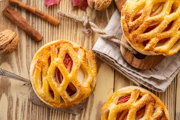 Homemade Apple pie or tart on autumn background. Autumn concept. Copy space.