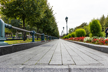 Naklejka premium Urban walking path on a garden in Moscow with nobody on it