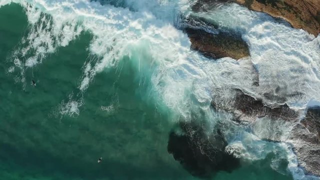 Waves breaking over rocks Sydney Australia