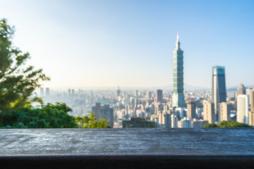 Wood or Wooden board with copy space and beautiful cityscape of taipei city
