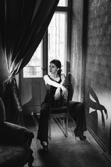 Elegant woman portrait studio shot black and white. Attractive adult brunette sexy girl on black background. Long beautiful healthy hair model girl stock image.