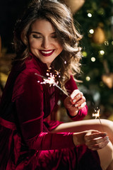 Happy and elegant woman portrait studio shot. Attractive adult brunette sexy girl. Long beautiful healthy hair model girl stock image. New Year portrait