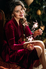 Happy and elegant woman portrait studio shot. Attractive adult brunette sexy girl. Long beautiful healthy hair model girl stock image. New Year portrait