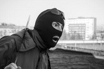 Shock and fear in the eyes of a gangster