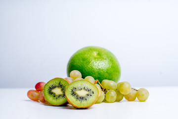 Obraz na płótnie Canvas Creative layout made of fruits on a white background