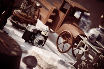 Vintage camera, tiny car and more on a flea market