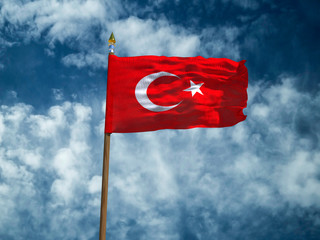 Turkey flag Silk waving flag of Turkey made transparent fabric with wooden flagpole gold spear on background sunny blue sky white smoke clouds real retro photo Countries of world 3d illustration