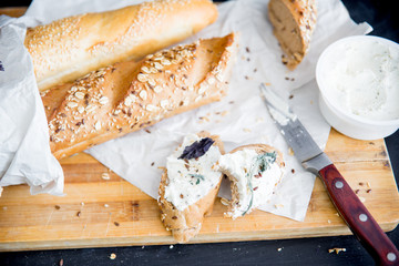 assorted fragrant loaves of bread with flour