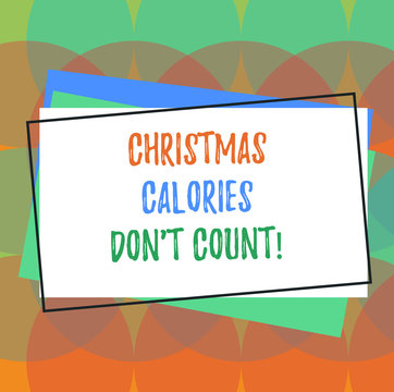 Text sign showing Christmas Calories Don T Count. Conceptual photo Eat whatever you want in holiday seasons Pile of Blank Rectangular Outlined Different Color Construction Paper