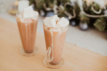 Cocoa with marshmallows in a glass beaker