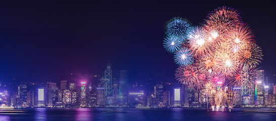 Happy new year fireworks over cityscape at night with empty white marlbe table,Banner mock up template for display or montage of product for holiday promotion advertising.